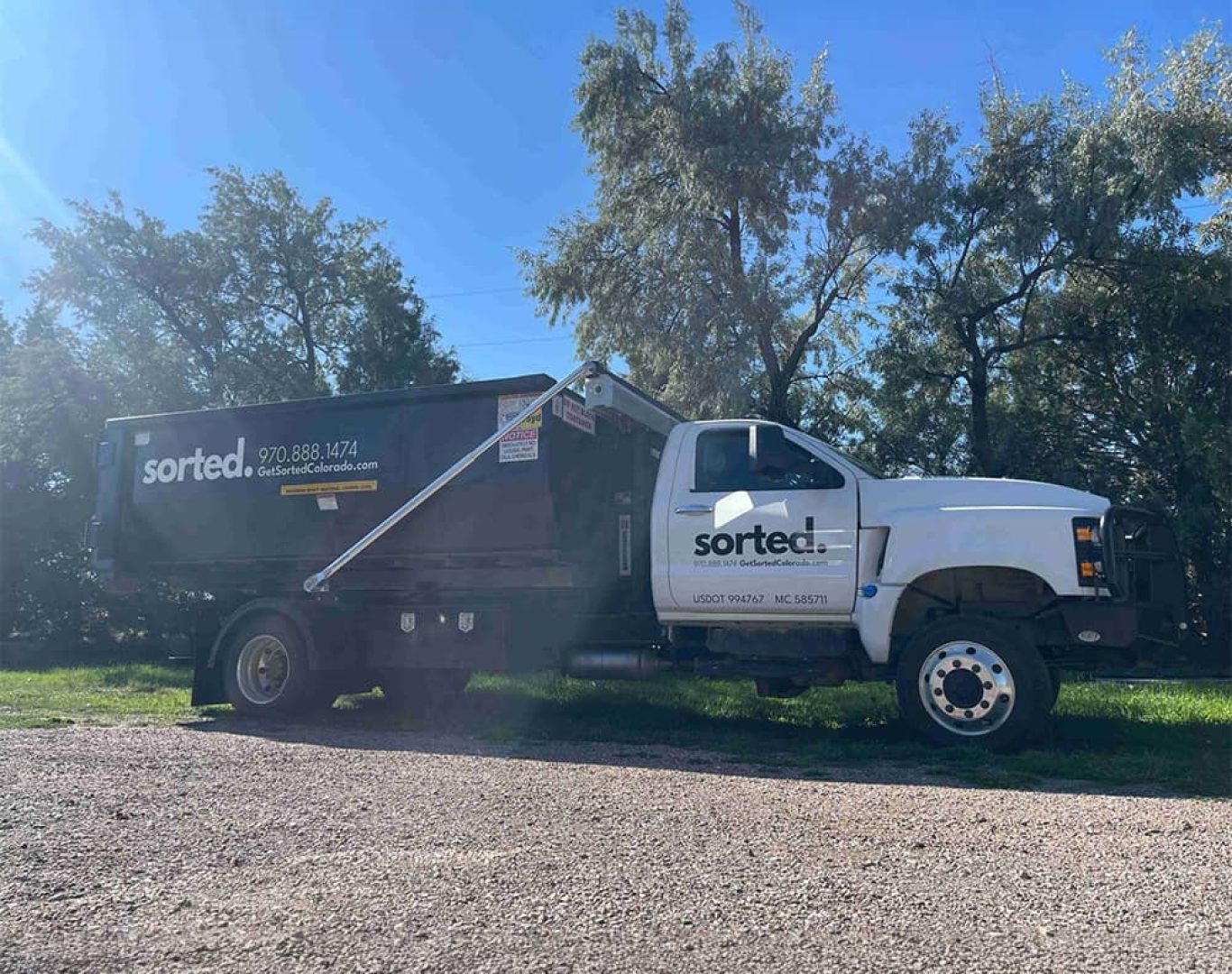 Sorted roll-off container on residential site in Greeley CO